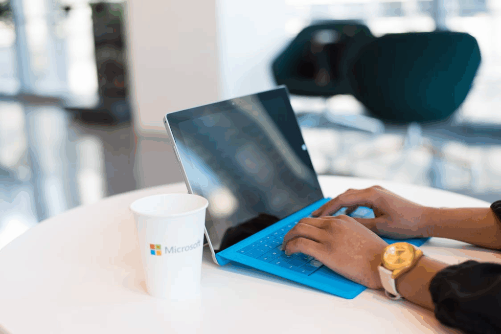 Person browsing software options on a laptop computer
