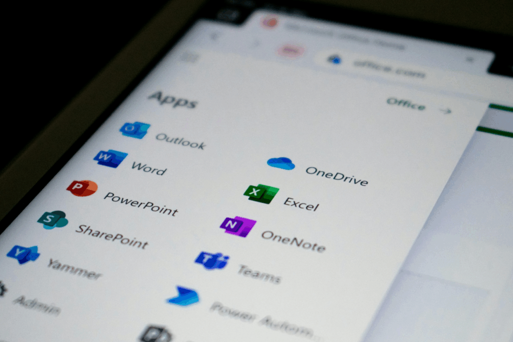 Close-up of a screen displaying Microsoft Office application icons