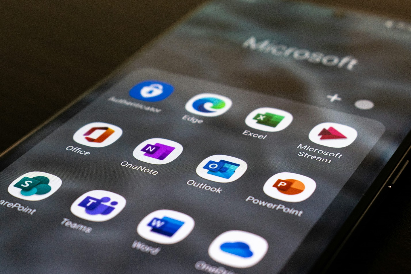 Microsoft Office 2019 for Mac: Is It Still Worth Buying in 2025? 1 Several Microsoft Office icons displayed on a phone screen.